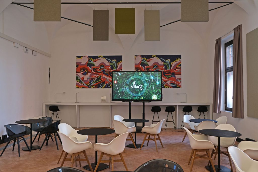 le village by ca milano bilancio