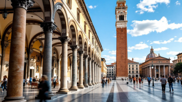 Panorama di Bologna con torri e piatti tipici