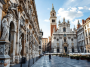 Panorama di Parma con monumenti storici e piatti tipici